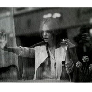 Mujer En ventana